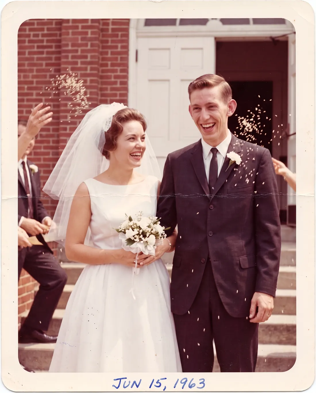 Peggy and Walt on the steps on their wedding day, June 15, 1963.